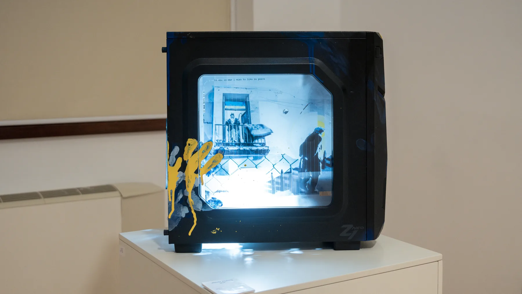 "Never-Ending War", 40 x 30 x 20 cm, Installation Art (digital collage, computer unit, lights), 2022